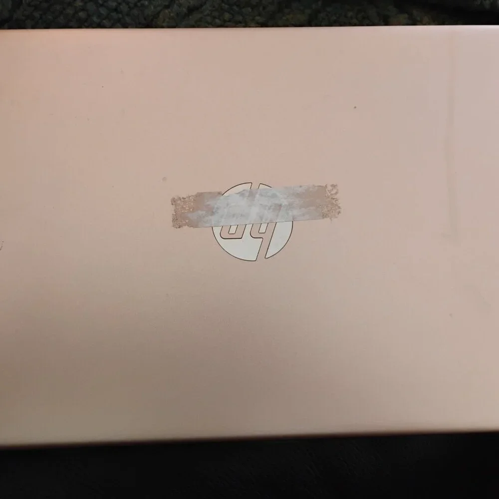 HP Rose Gold Portable Laptop.